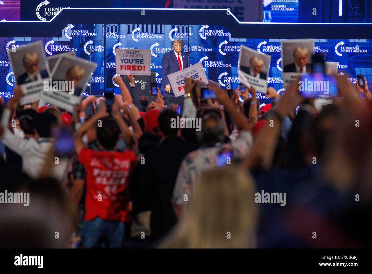 Former President Donald Trump speaks at a Turning Point Action convention in Detroit, Mich., on
