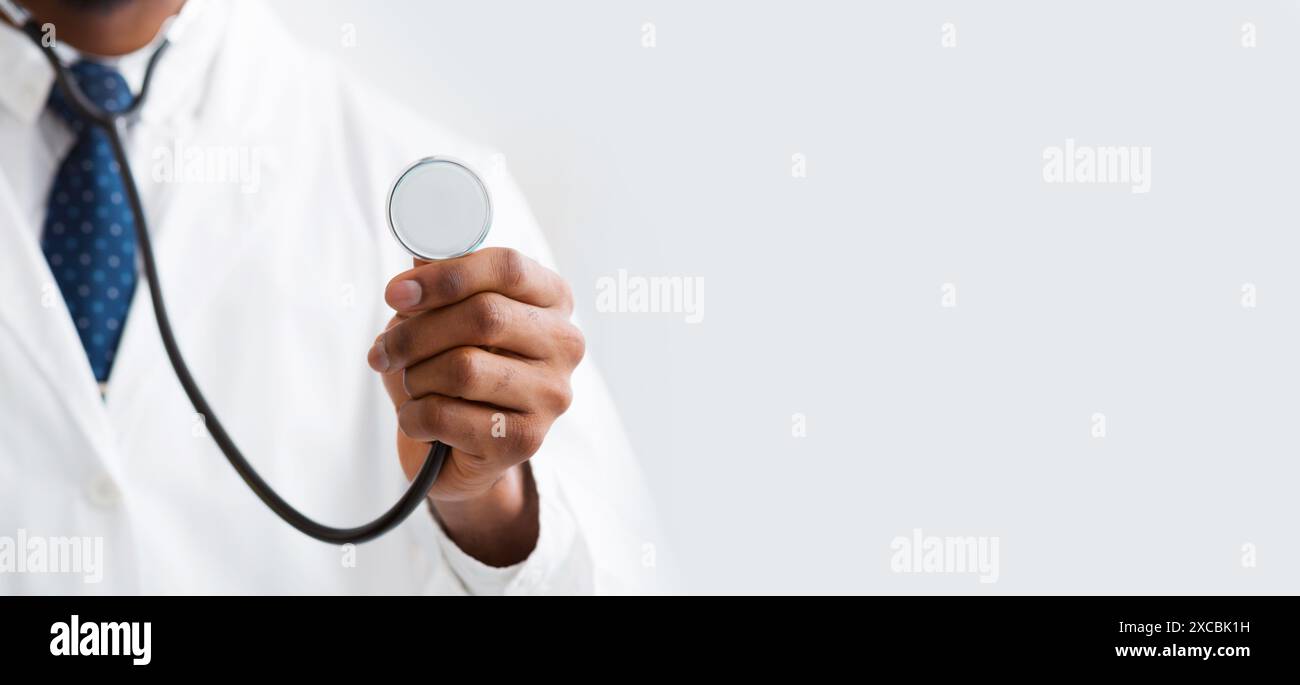 Doctor in black tie stethoscope hi-res stock photography and images - Alamy