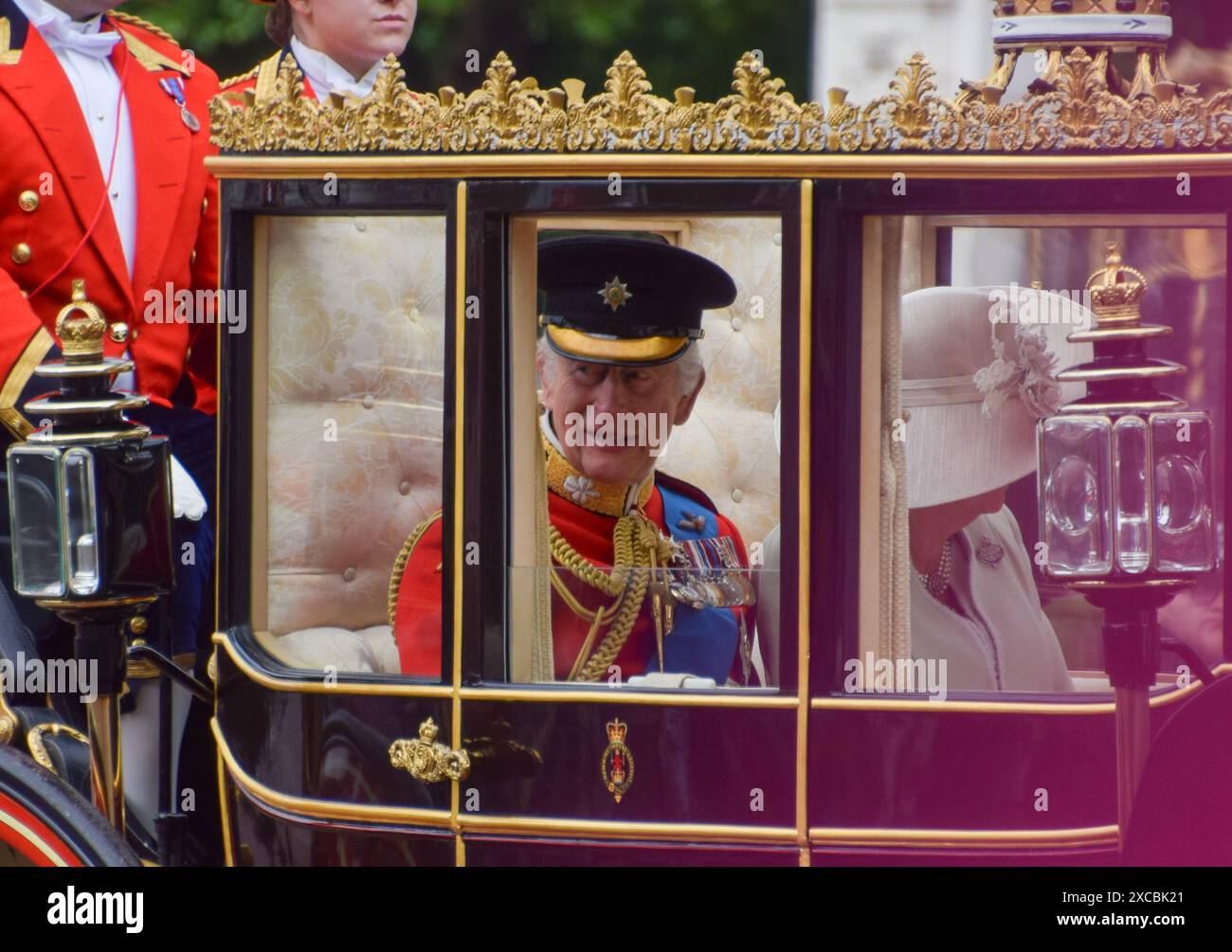 London, UK. 15th June 2024. King Charles III and Queen Camilla ride in
