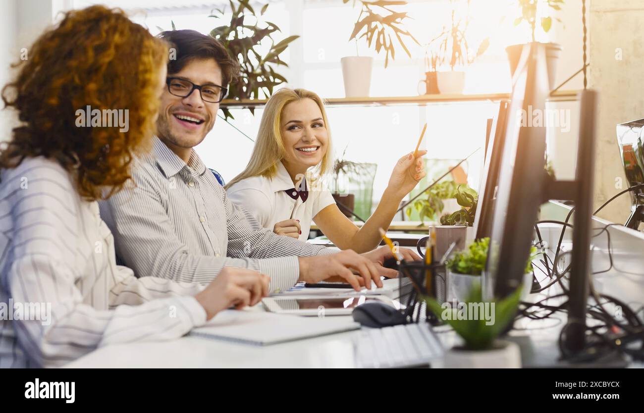 Diverse Professionals Working Together in Modern Office Stock Photo