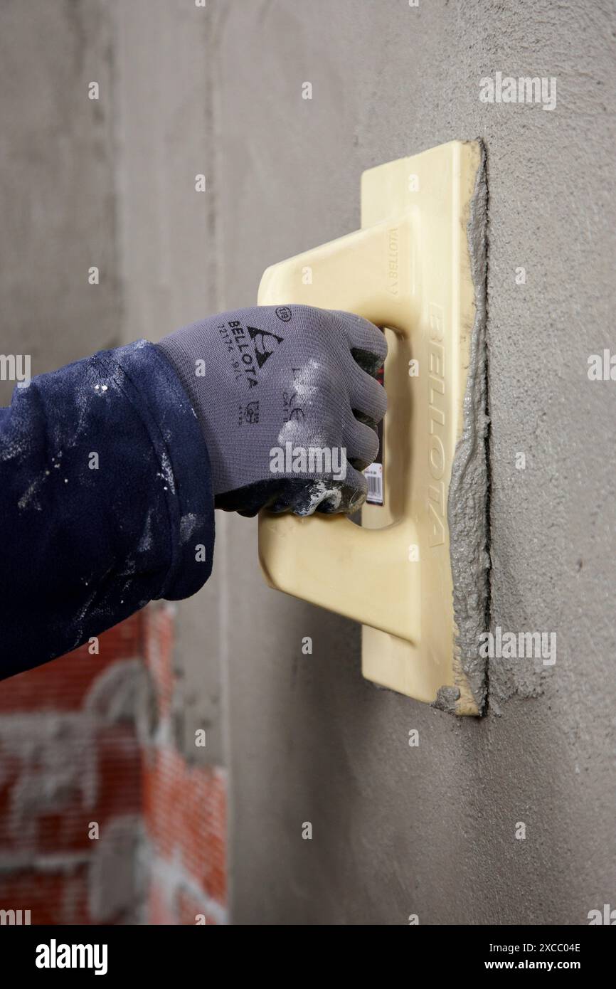 Roughcast, grout float, new homes under construction, construction site ...