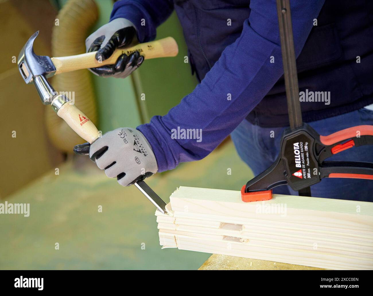 Chisel and hammer, woodworking and carpentry tools Stock Photo