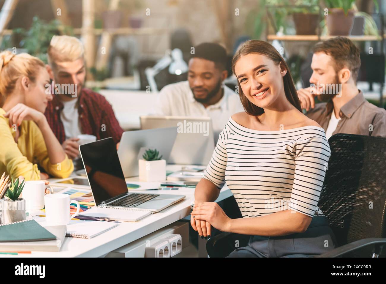 Young Professionals Collaborating in Modern Office During Daytime Stock Photo