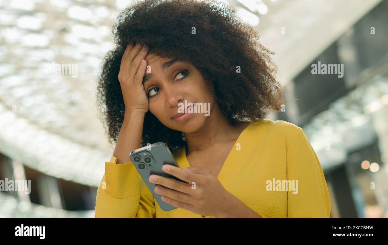 Fresh Look at African American Woman Looking Smartphone Mobile Phone Screen Holding