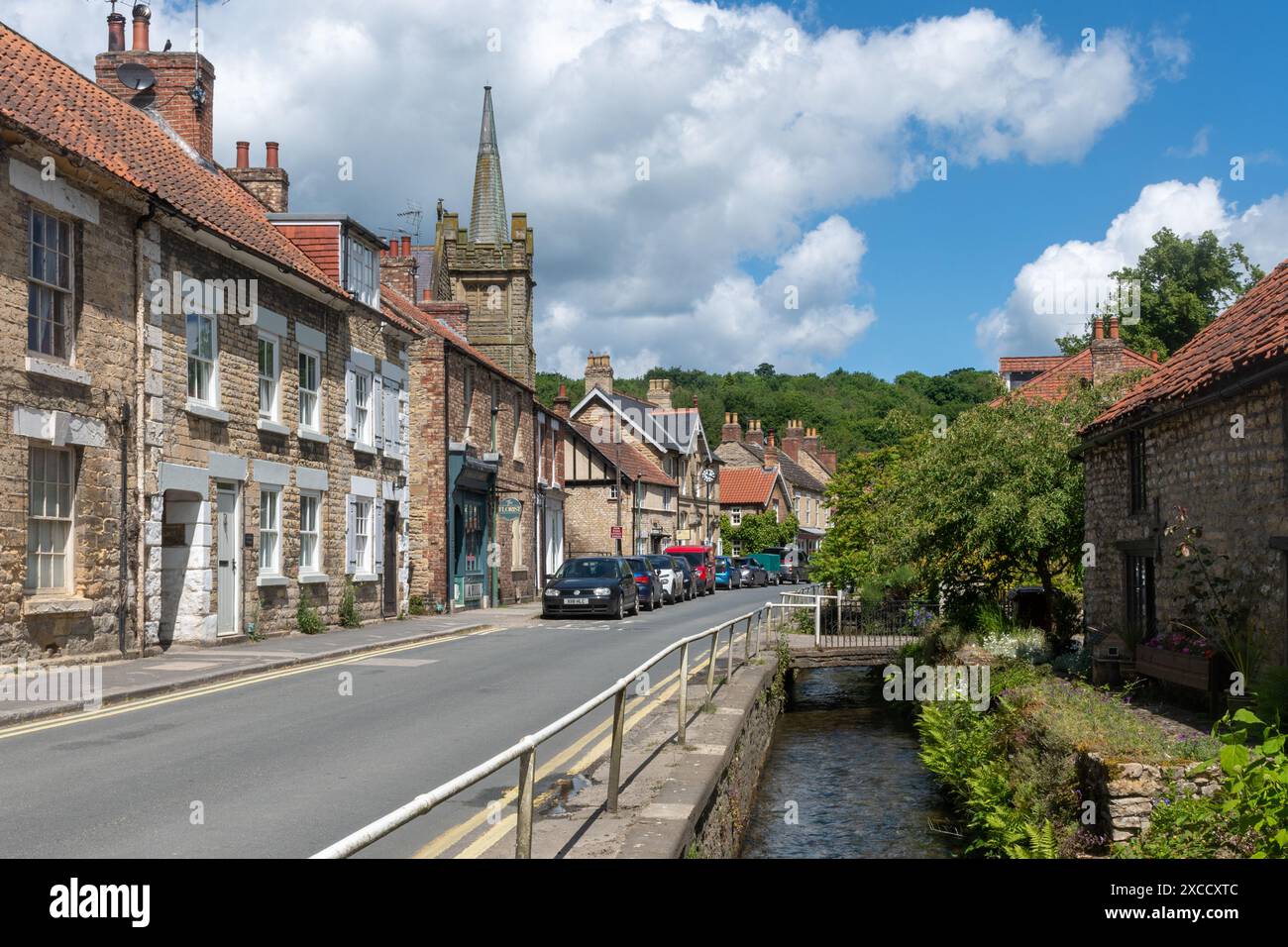 Thornton-le-Dale, view of the pretty village in North Yorkshire, England, UK, with a stream running through the village Stock Photo