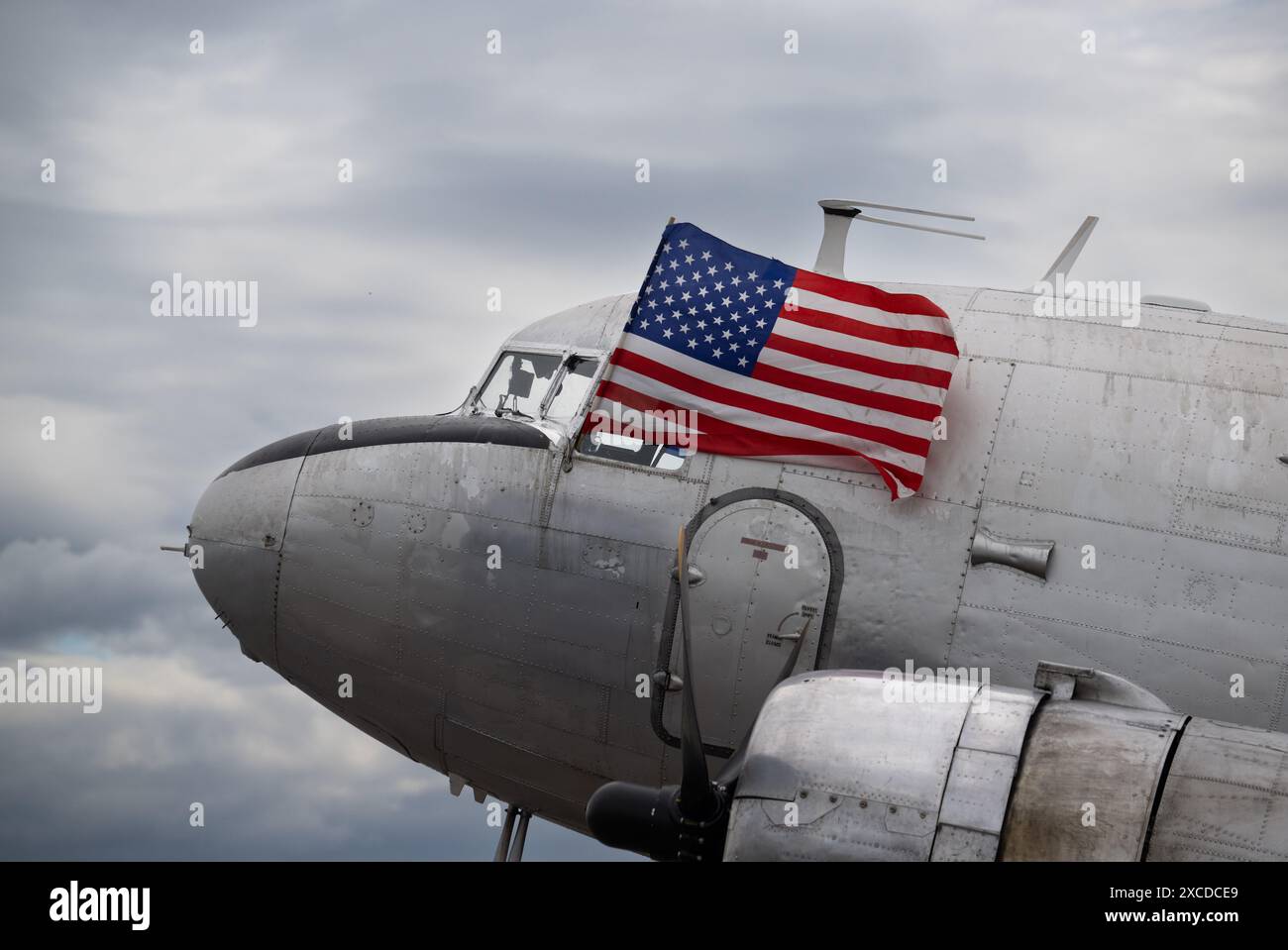 16 June 2024, Hesse, Wiesbaden: A US flag flies from the cockpit of a ...