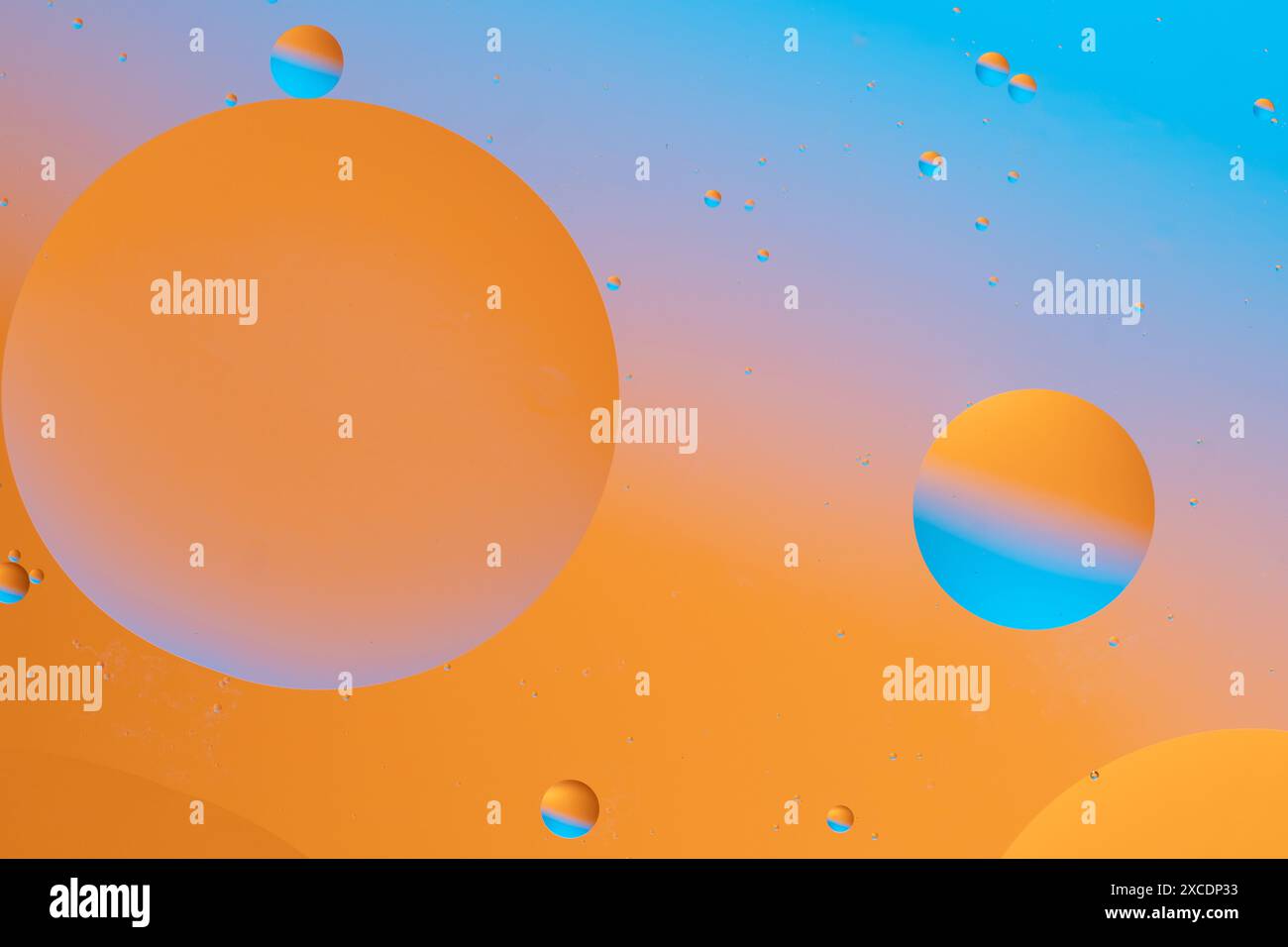 Abstract spheres floating on a gradient background Stock Photo