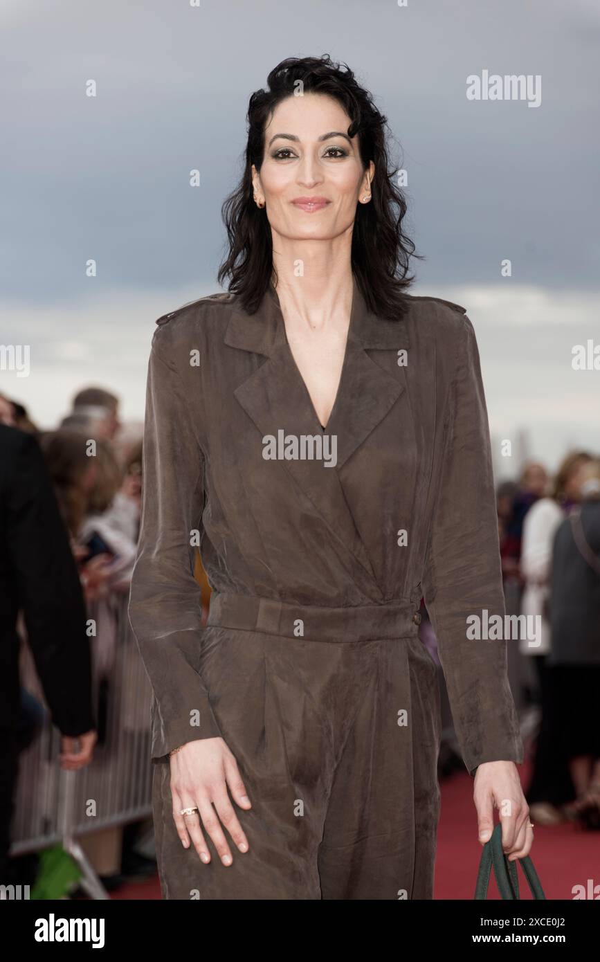 Cabourg, France. 15th June, 2024. Laetitia Eido walks the red carpet during the 38th Cabourg