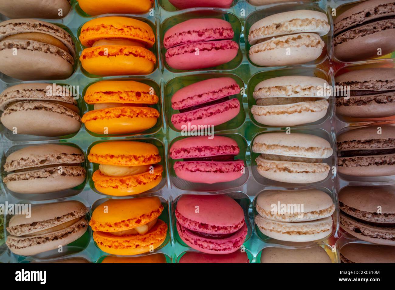 French macaroons in rows in packaging from a shop Stock Photo
