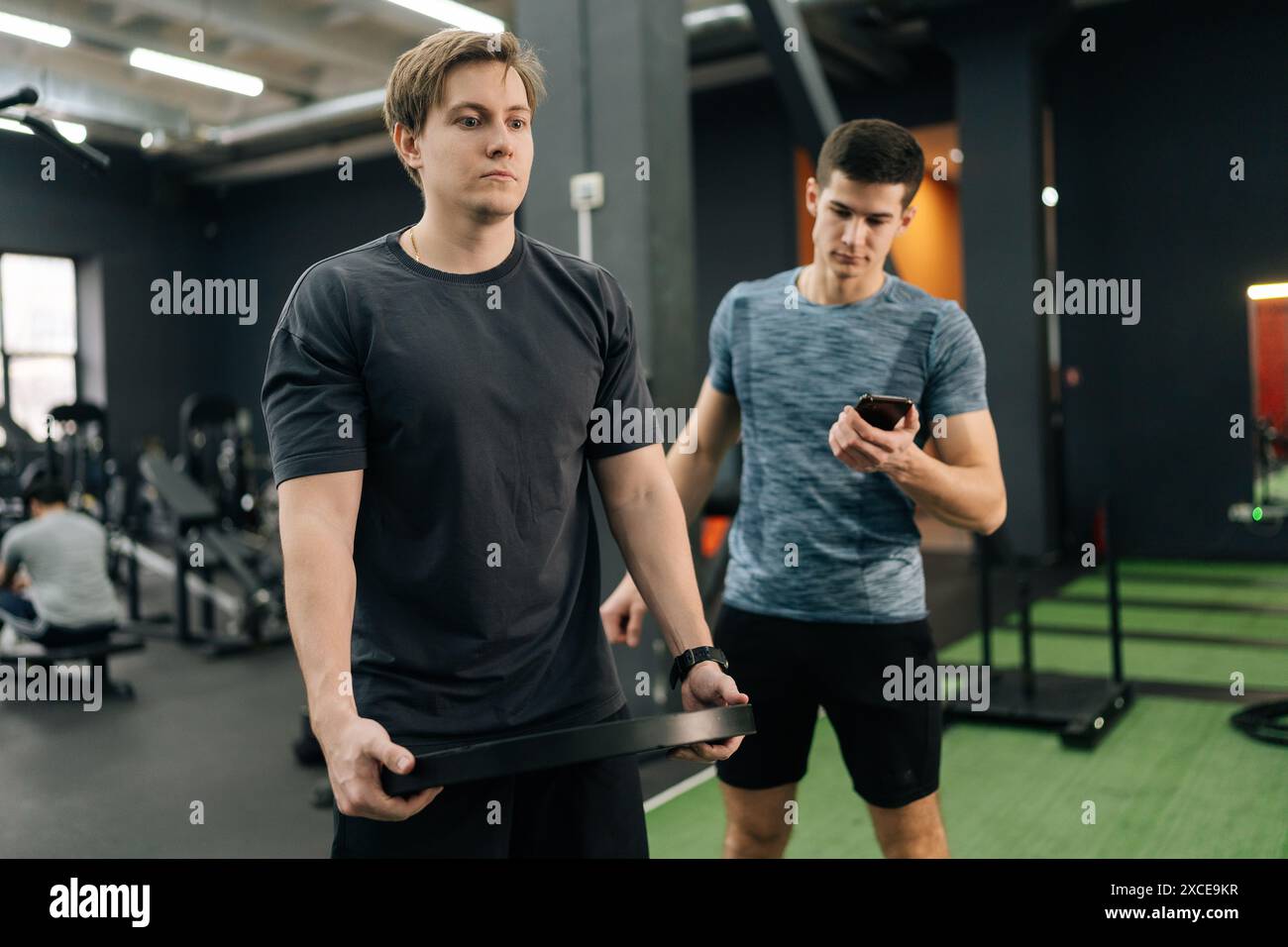 Muscular caucasian man rotating two hi-res stock photography and images ...