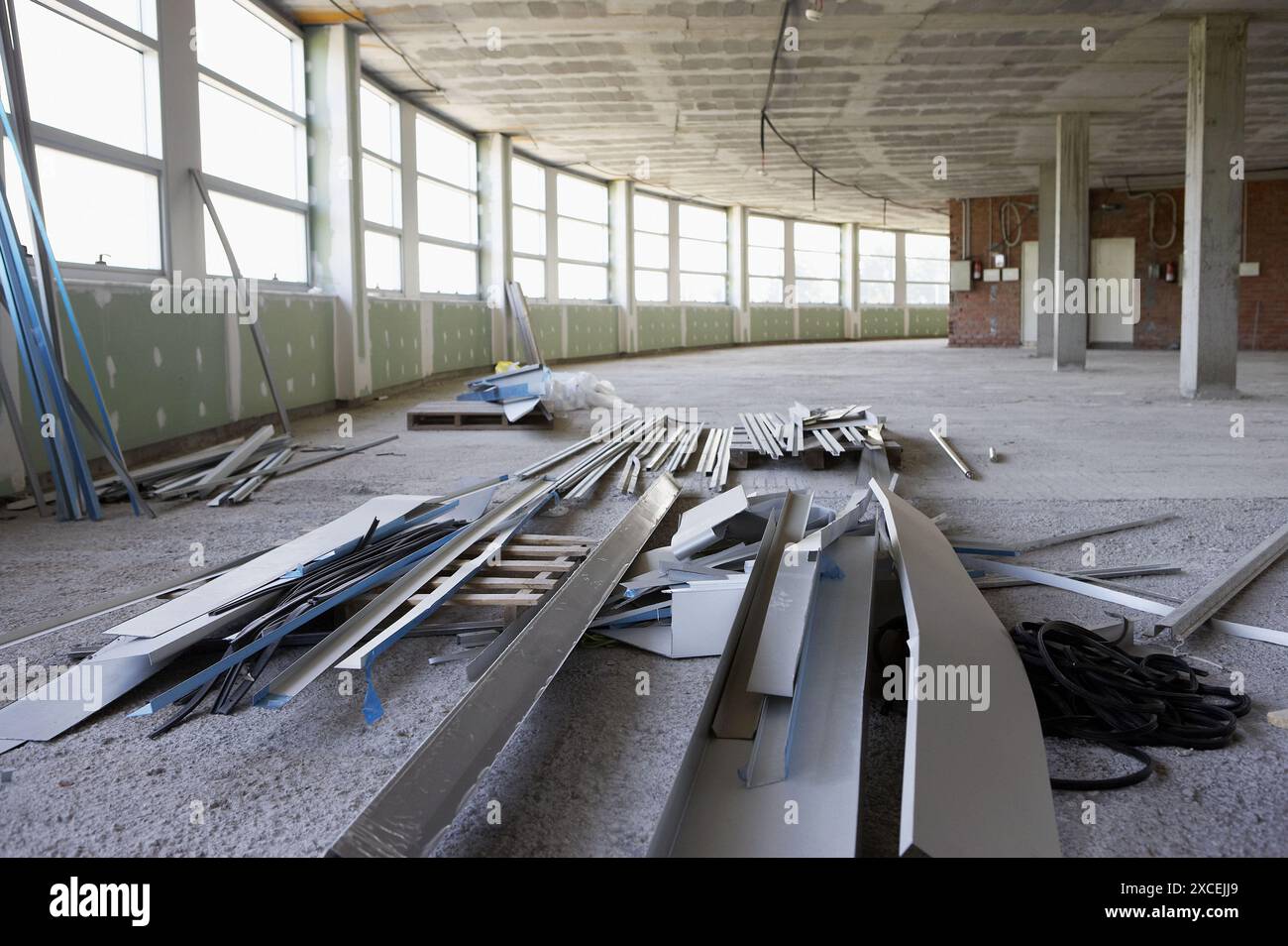 Remains of aluminium construction material, office building under construction Stock Photo