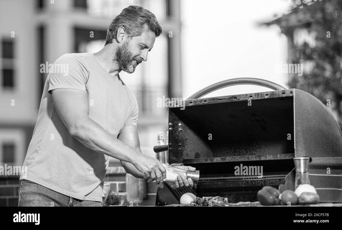 Grilled ribeye steaks on Black and White Stock Photos & Images - Alamy