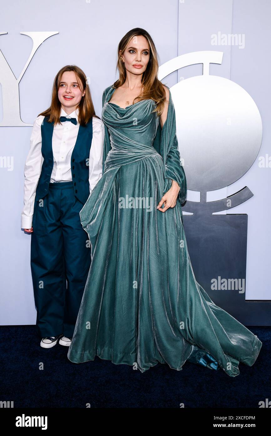 Vivienne Jolie-Pitt and Angelina Jolie walking on the red carpet at the ...