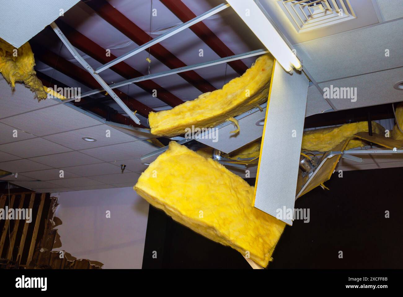 Damaged ceiling is demolition project during renovation of commercial ...