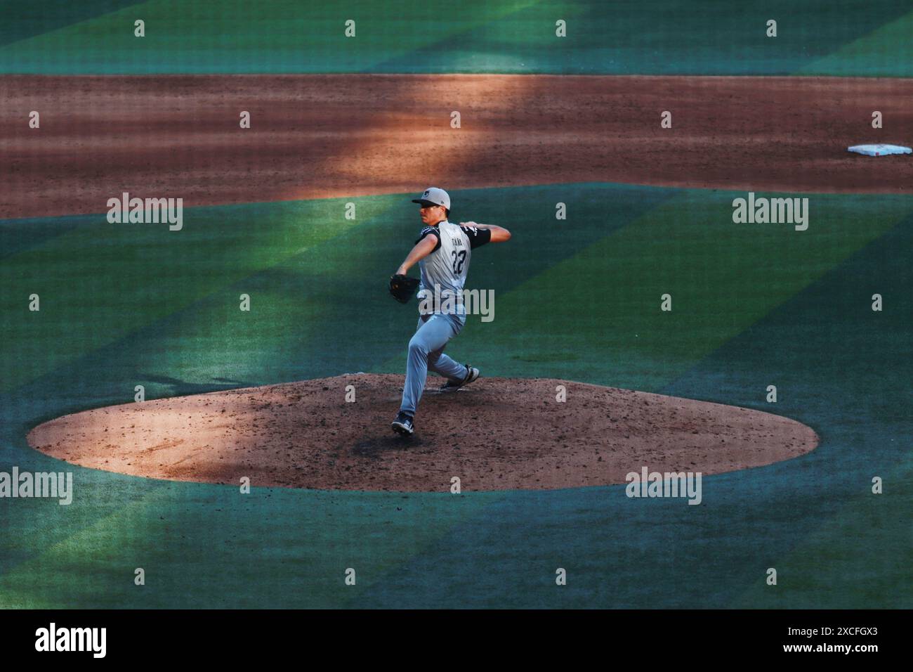 Non Exclusive: Henry Omana #22  of Olmecas de Tabasco pitches the ball during the match 2  between Olmecas de Tabasco and Diablos Rojos del México of Stock Photo