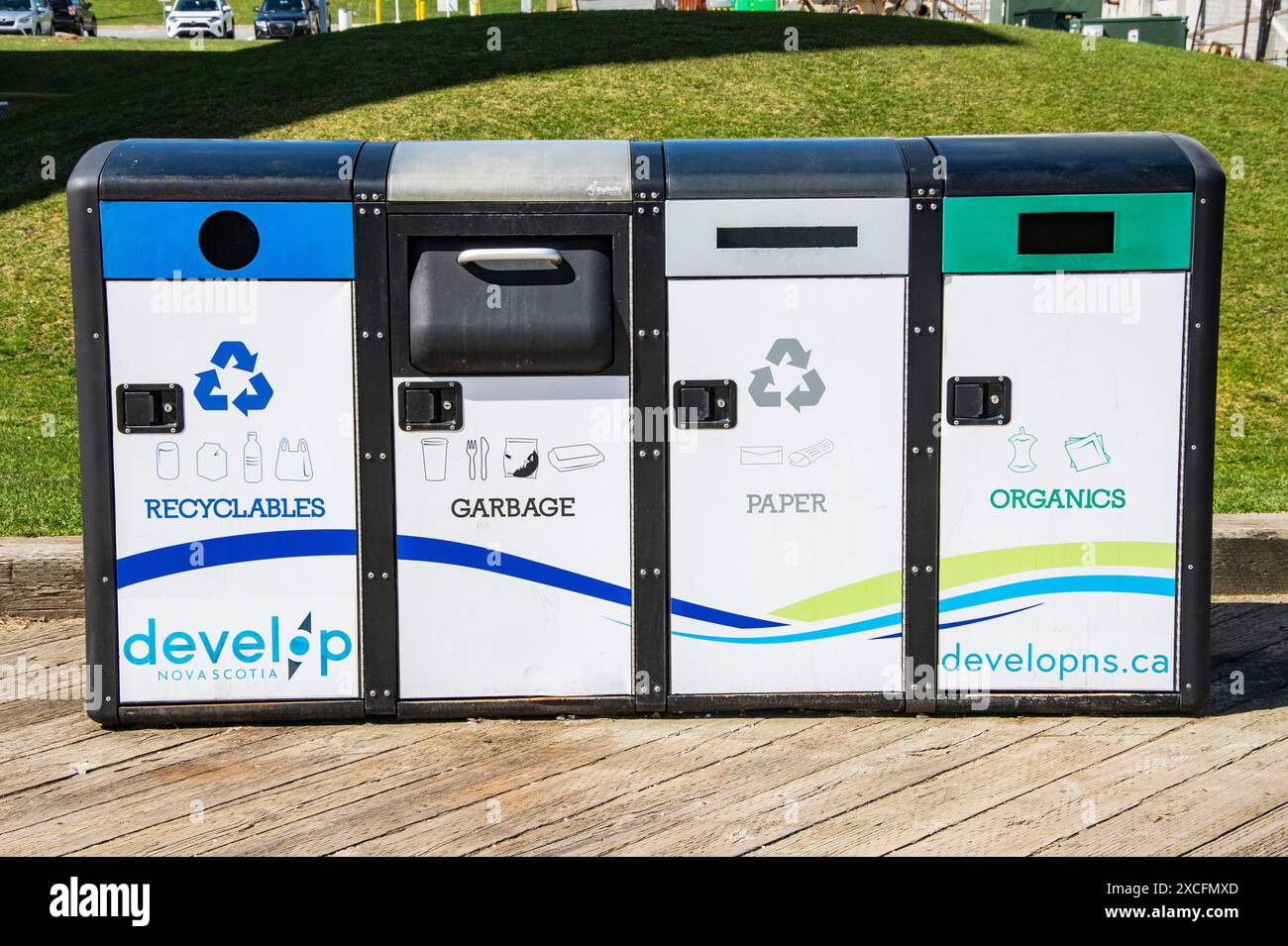 Garbage and recycling bins at the waterfront boardwalk in Halifax, Nova Scotia, Canada Stock