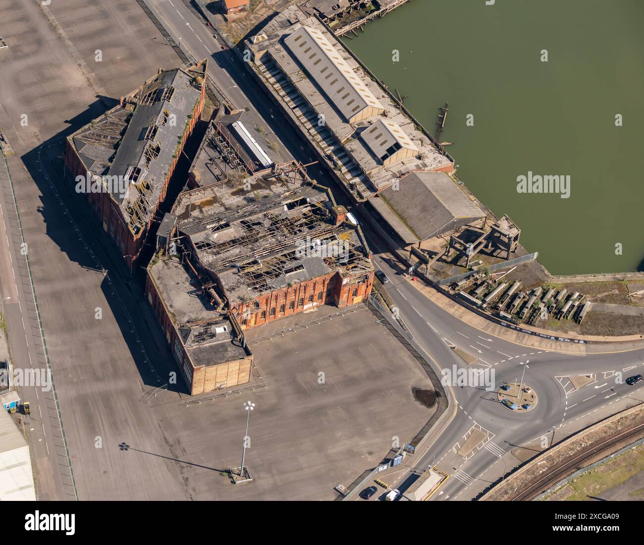 Aerial photo of derelict Grimsby Ice Company Building and quayside from 1500 feet Stock Photo