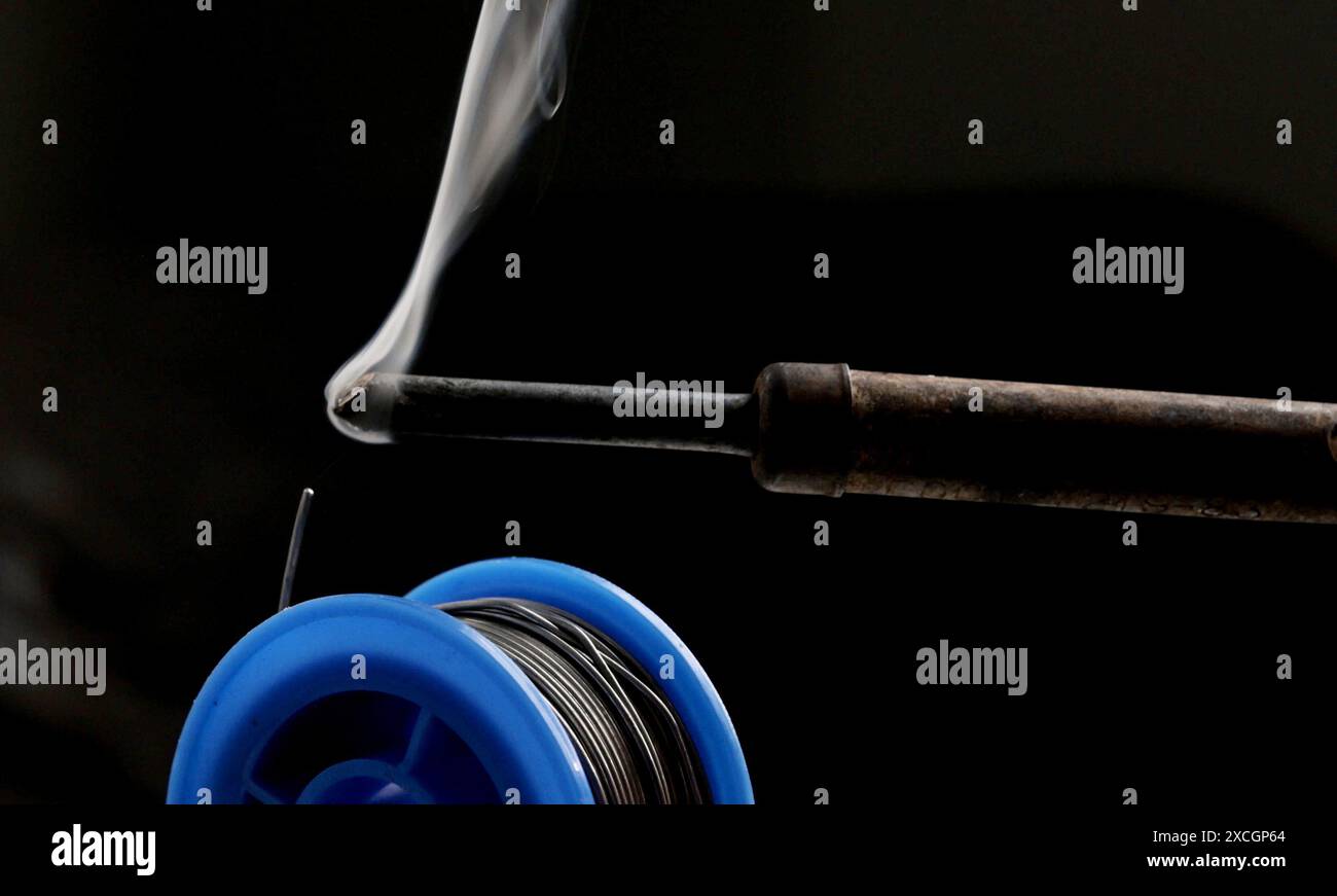 Tin soldering iron tool hi-res stock photography and images - Alamy