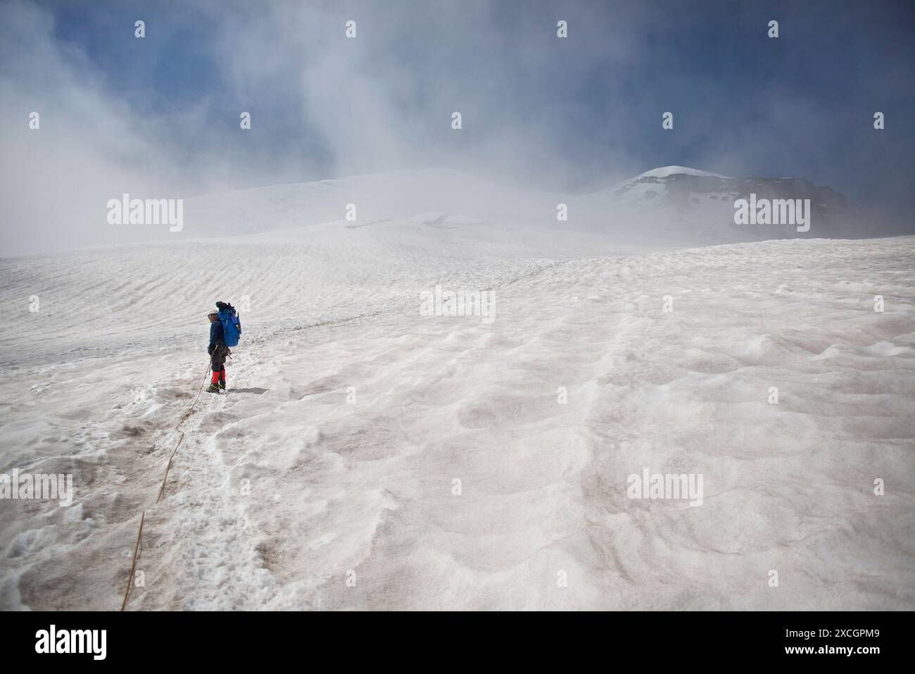 Mountain climber ascending to Camp Schurman on Mount Rainier, Mount