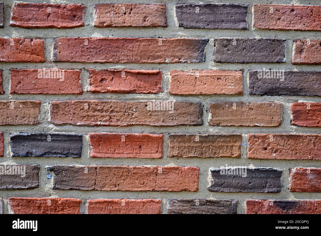 A brick and cement wall Stock Photo