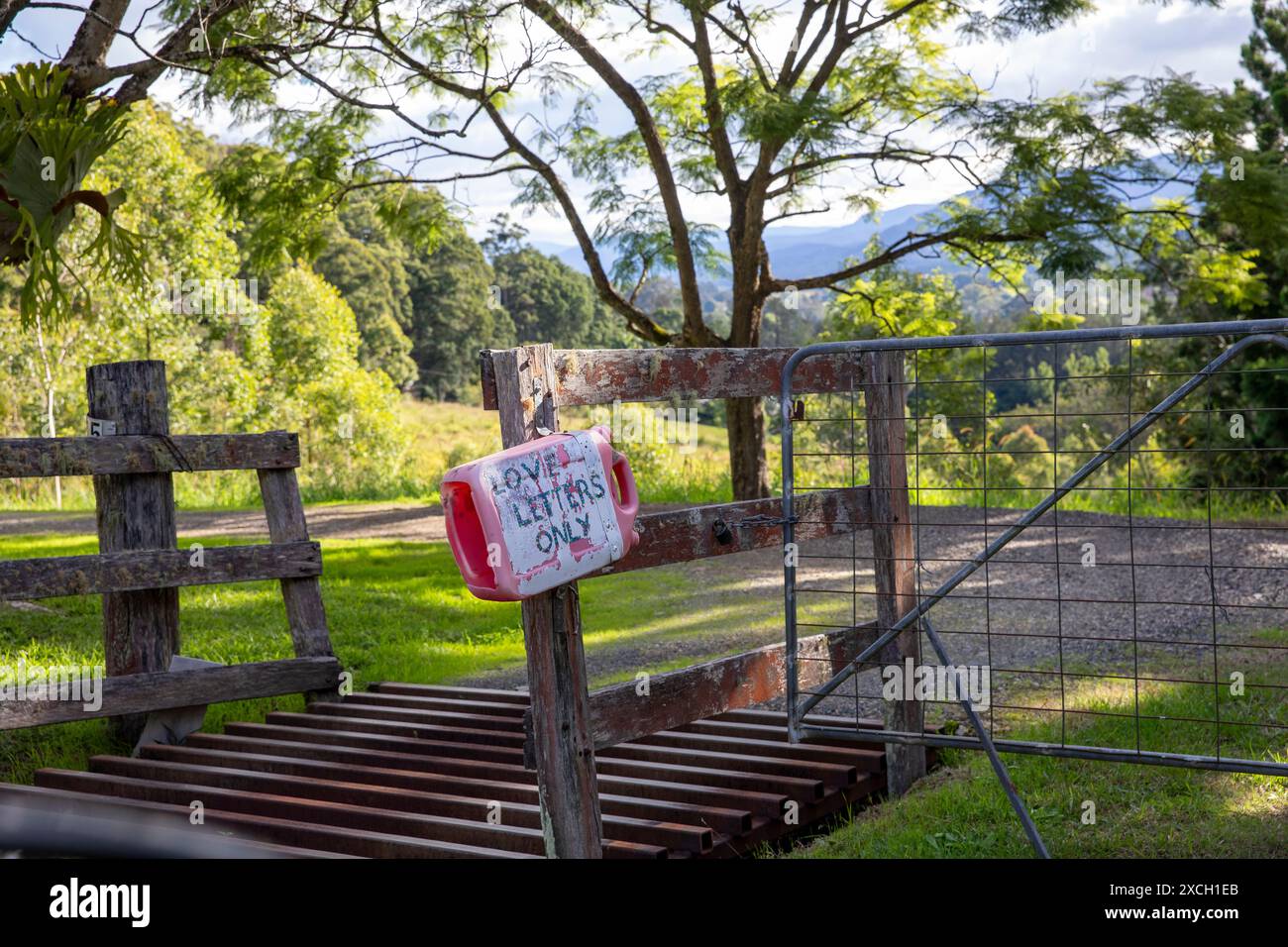 Watering can mail letter box hi-res stock photography and images - Alamy