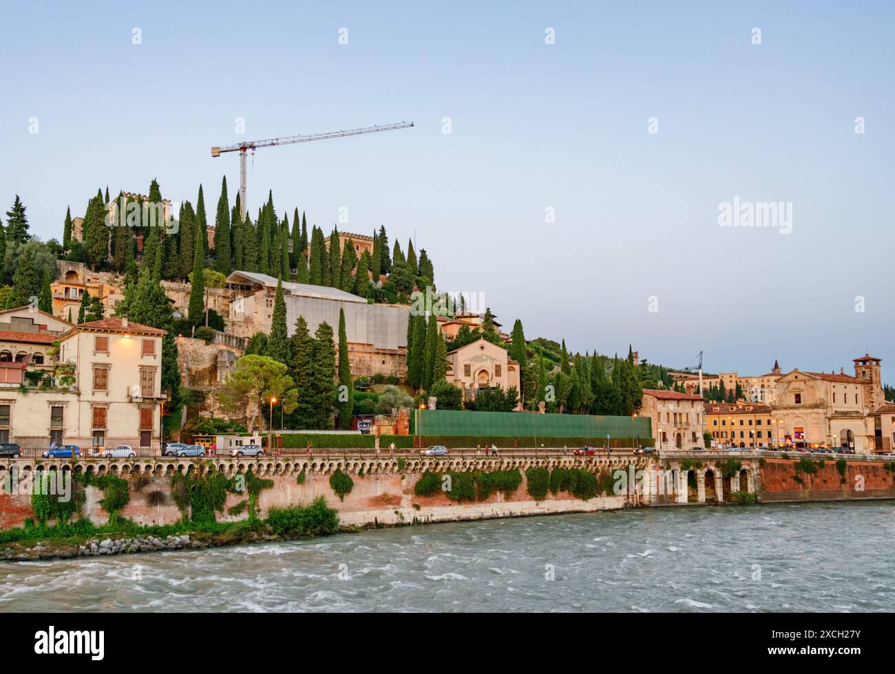 View of waterfront of the Adige River in Verona, Italy. Verona is a ...