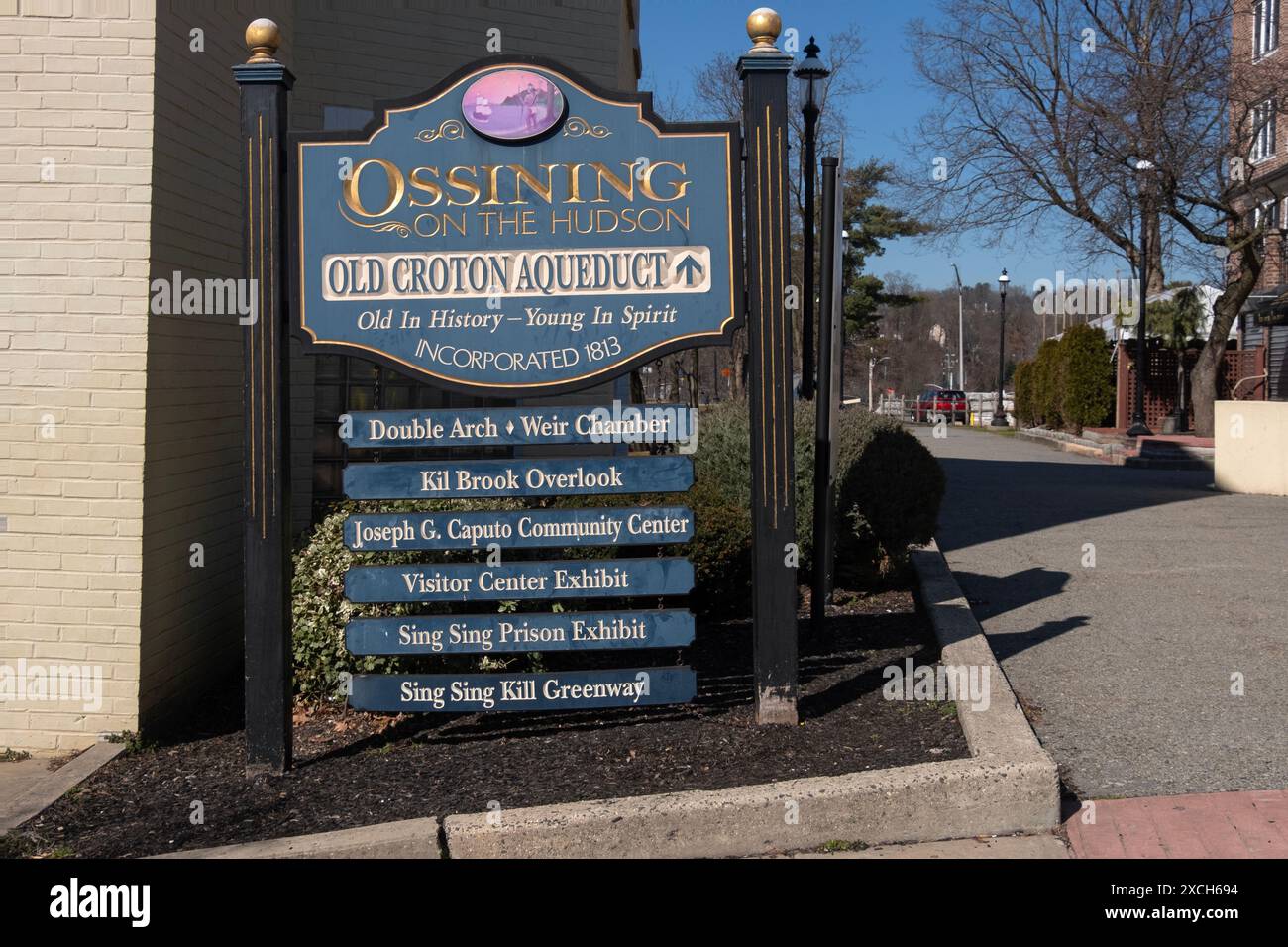 A welcome to Ossining sign listing some of the attraction in the Westchester County village. Stock Photo