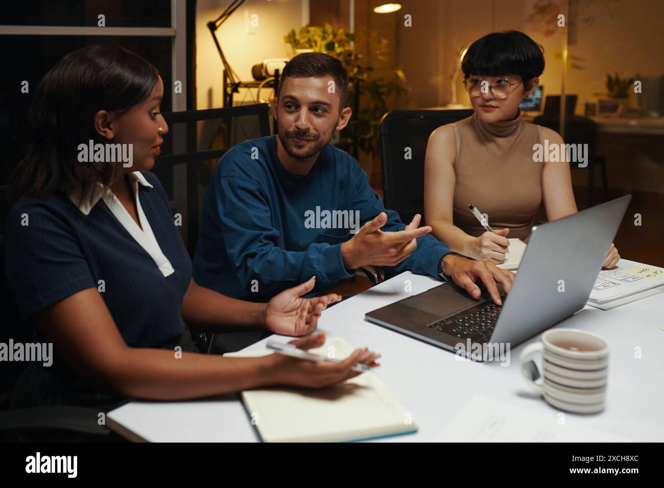 Small business team discussing ideas for project development Stock Photo