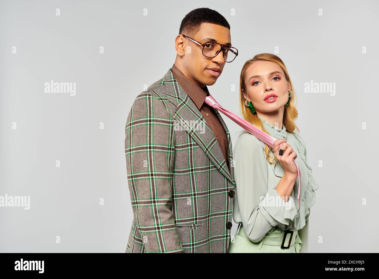 A man and woman striking a loving pose Stock Photo - Alamy