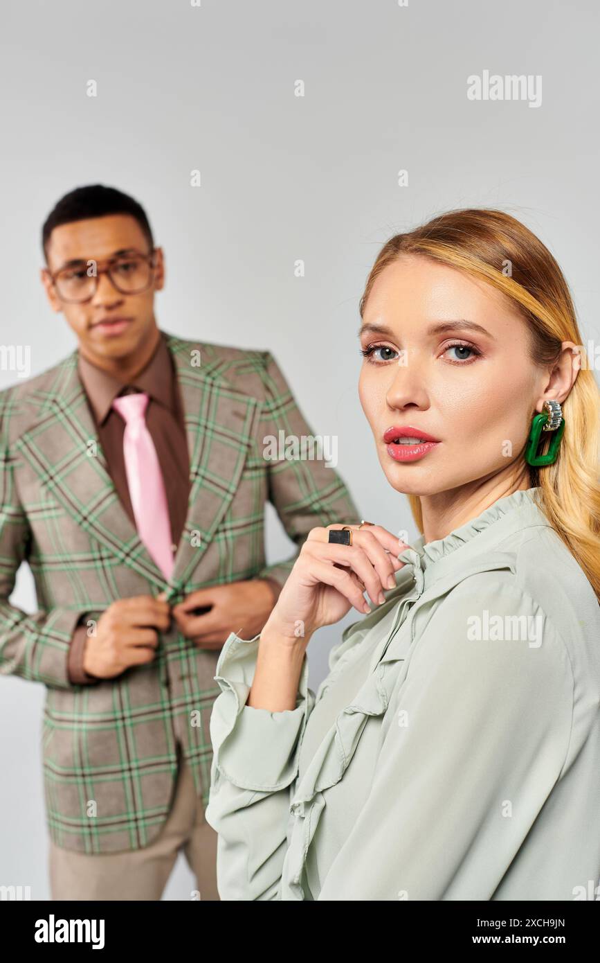 A man and a woman striking a pose together Stock Photo - Alamy