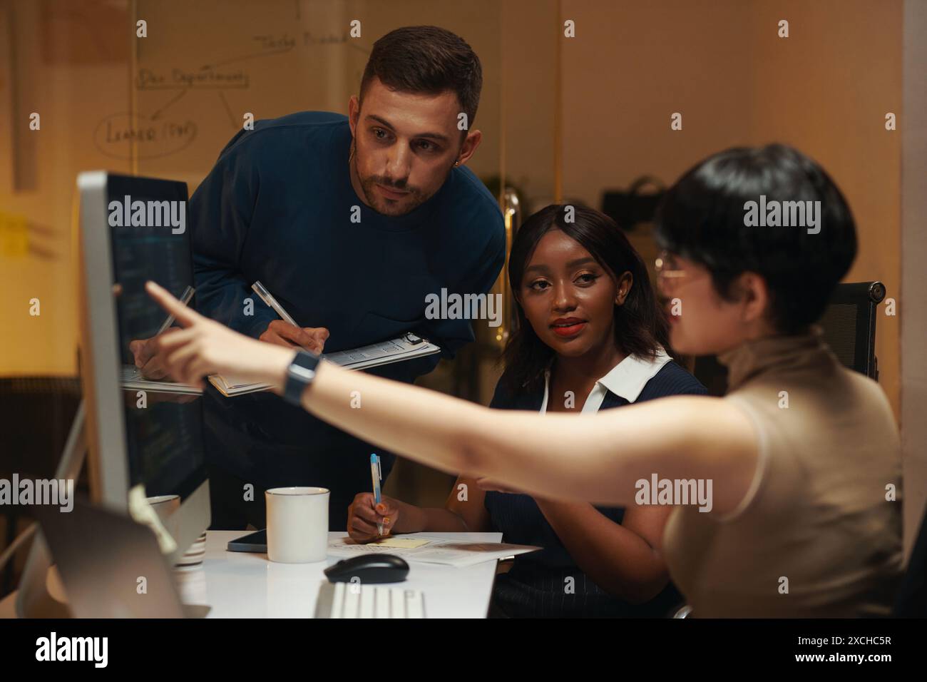 Group of developers working on new project together Stock Photo