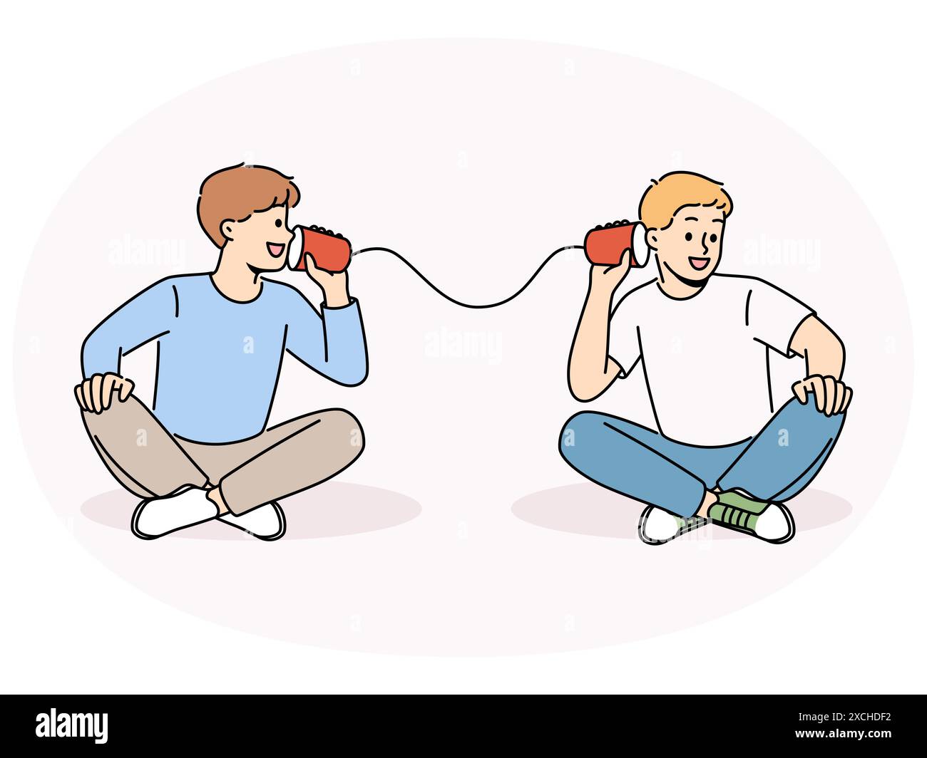 Smiling boys talk on tin can phone. Happy children have fun speak on ...