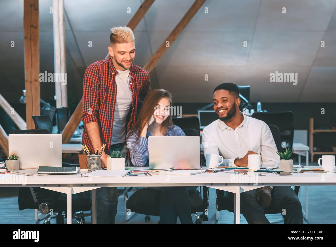 Deadline concept. Creative team working late at night Stock Photo