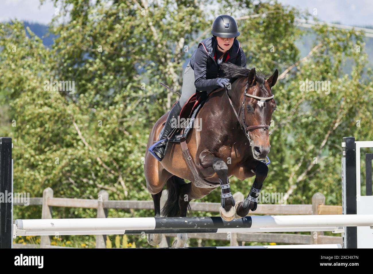 Lierskogen 20240617. Emma Tallulah Behn,the daughter of Princess Martha Louise, performs a jumping demonstration on a Belgian horse during the visit of Princess Astrid of Belgium at Stall Gullik. Photo: Geir Olsen / NTB Stock Photo