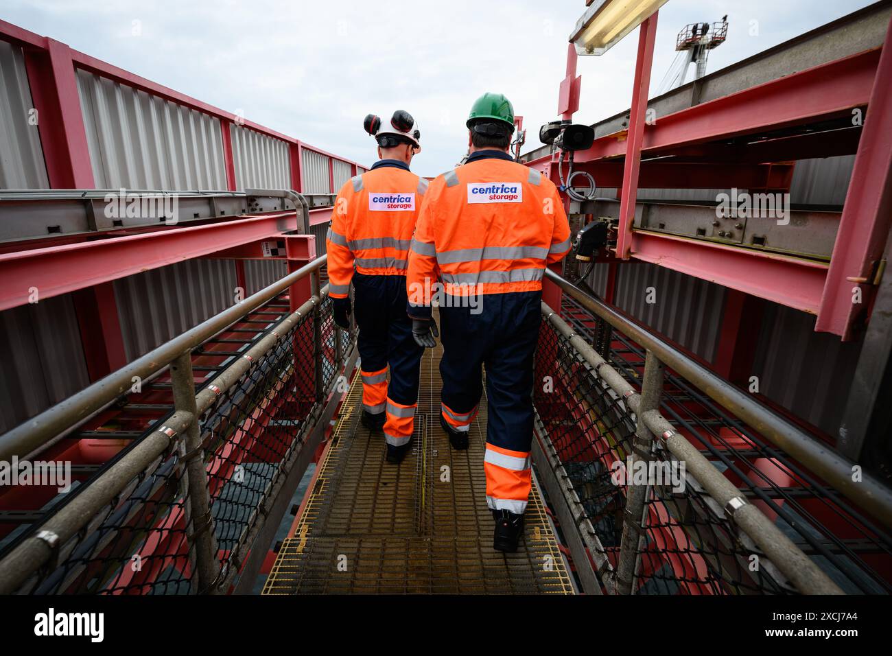 Members of the Centrica crew walk along a gangway on the the Rough 47 ...