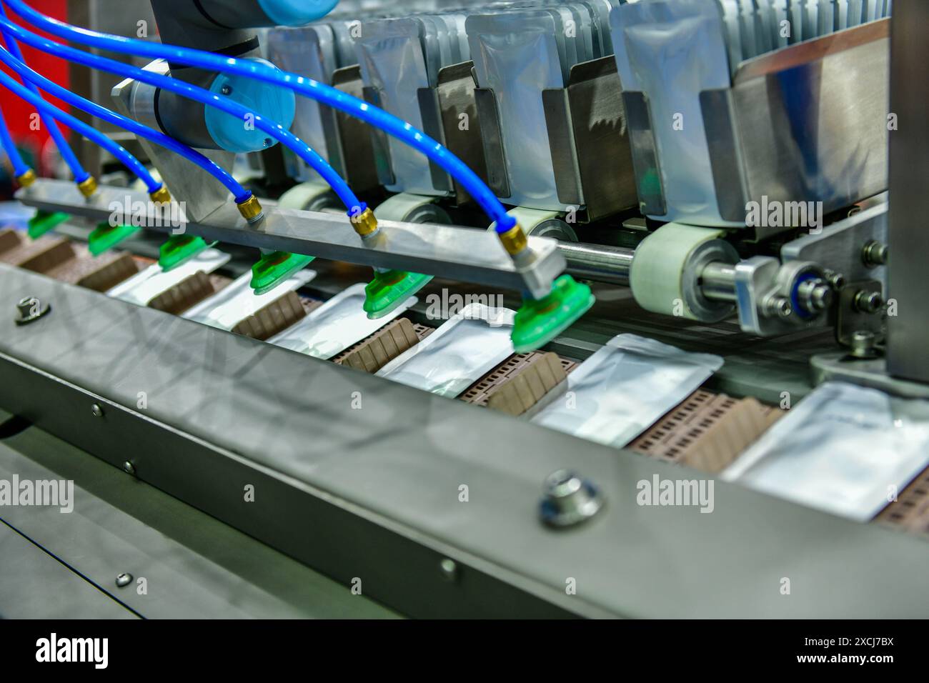 Aluminium Foil Bag Packaging at Industrial Modern machine for packaging line Stock Photo