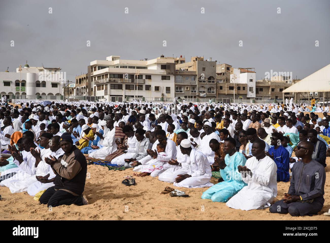 Nicolas Remene / Le Pictorium -  Tabaski Day in Dakar -  17/06/2024  -  Senegal / Dakar  -  Followers of the Layene Senegalese community perform a prayer during Tabaski (Aid al-Adha) celebrations in the popular Yoff district of Dakar, on June 17, 2024. Stock Photo