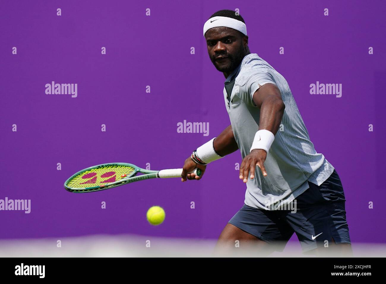 Queens Rinky Frances Tiafoe in action against Rinky Hijikata (not pictured) on day ...