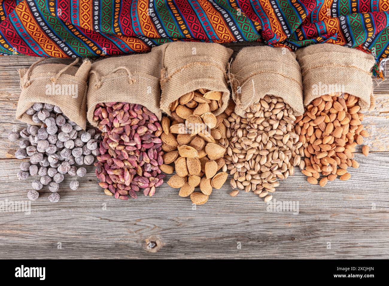 Assorted nuts and seeds background. mixed raw food for snacking, top ...