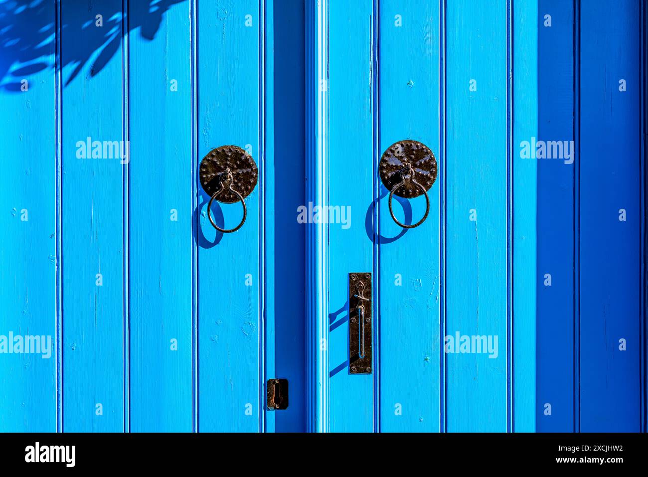 Blue weathered mediterranean style door Stock Photo - Alamy