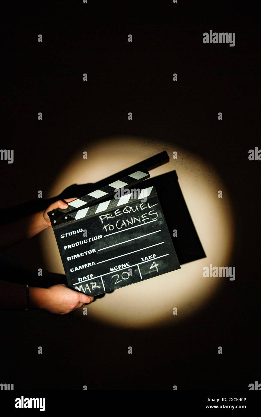 Hands holding a clapperboard Stock Photo