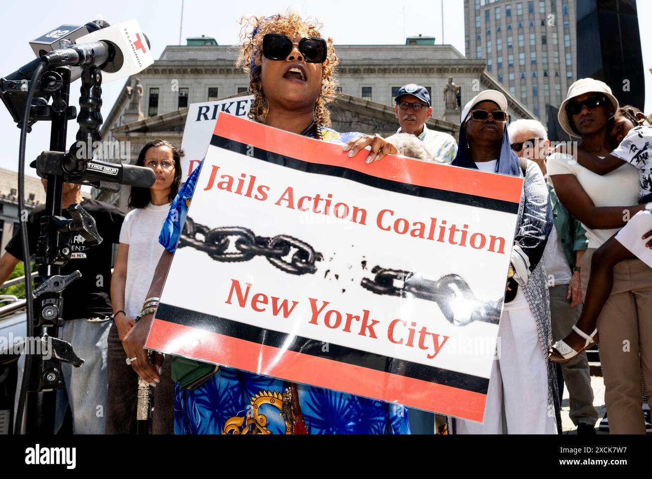 June 17, 2024, New York City, New York, United States: A woman holding a sign at a rally to urge the New York City Board of Correction to adopt rules to implement Local Law 42 to end solitary confinement in New York City jails, in Foley Square in New York City. (Credit Image: © Michael Brochstein/ZUMA Press Wire) EDITORIAL USAGE ONLY! Not for Commercial USAGE! Stock Photo