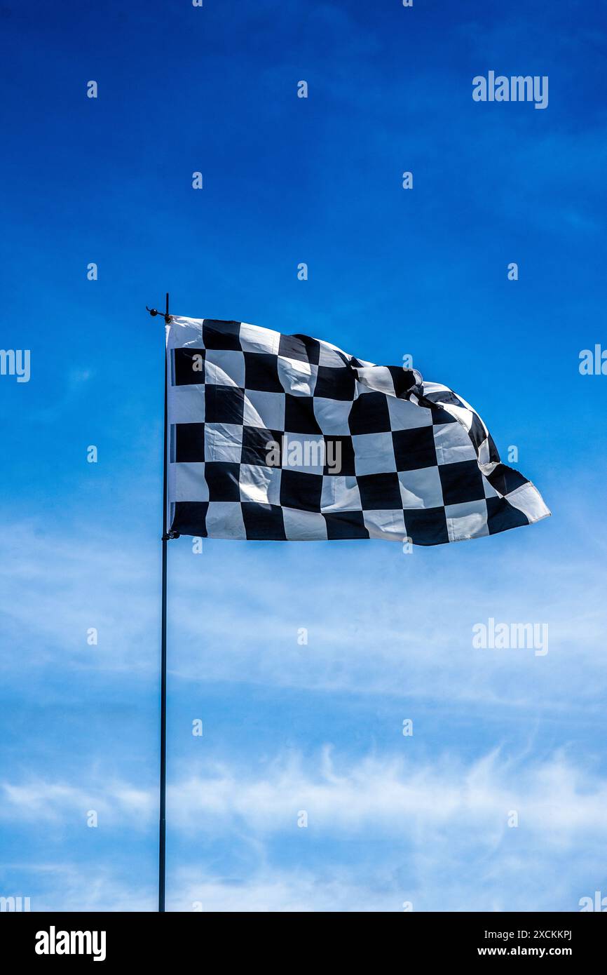 Flags At Rally's A chequered flag flies at a car rally in Bideford Stock Photo - Alamy