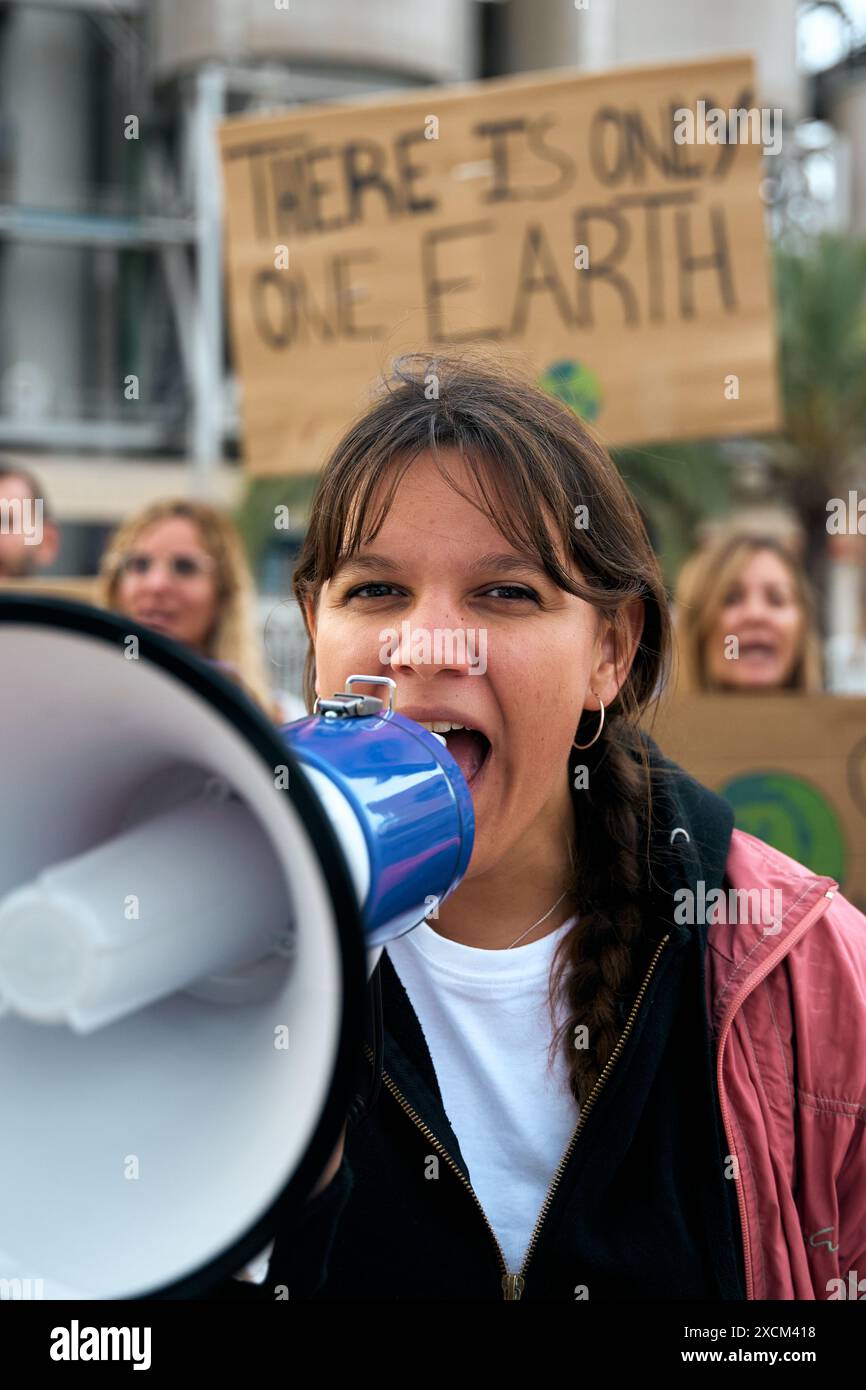 Close up nonconformist gen z activist woman shouting at protest ...