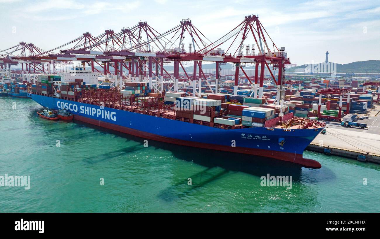 QINGDAO, CHINA - JUNE 18, 2024 - Container ships carry out container ...