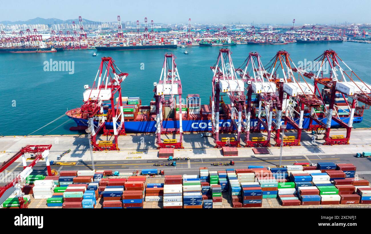 QINGDAO, CHINA - JUNE 18, 2024 - Container ships carry out container ...
