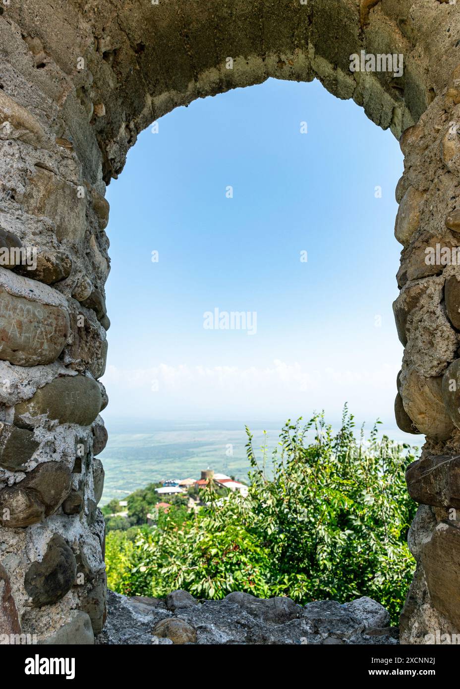 ancient window, stone building, view through the window, summer Stock ...