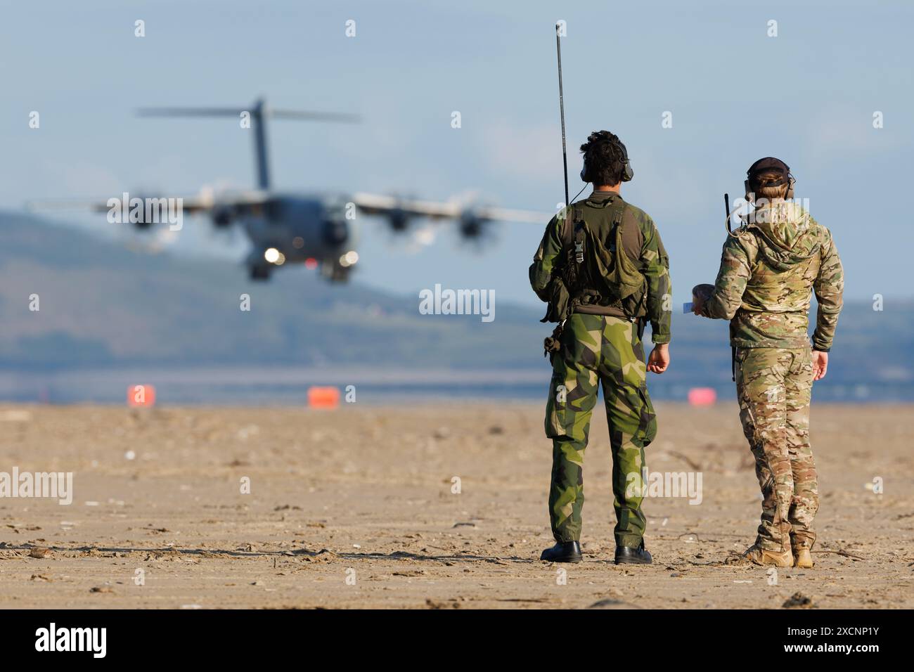 RAF A400 on the beach after conducting a natural surface landing Stock Photo