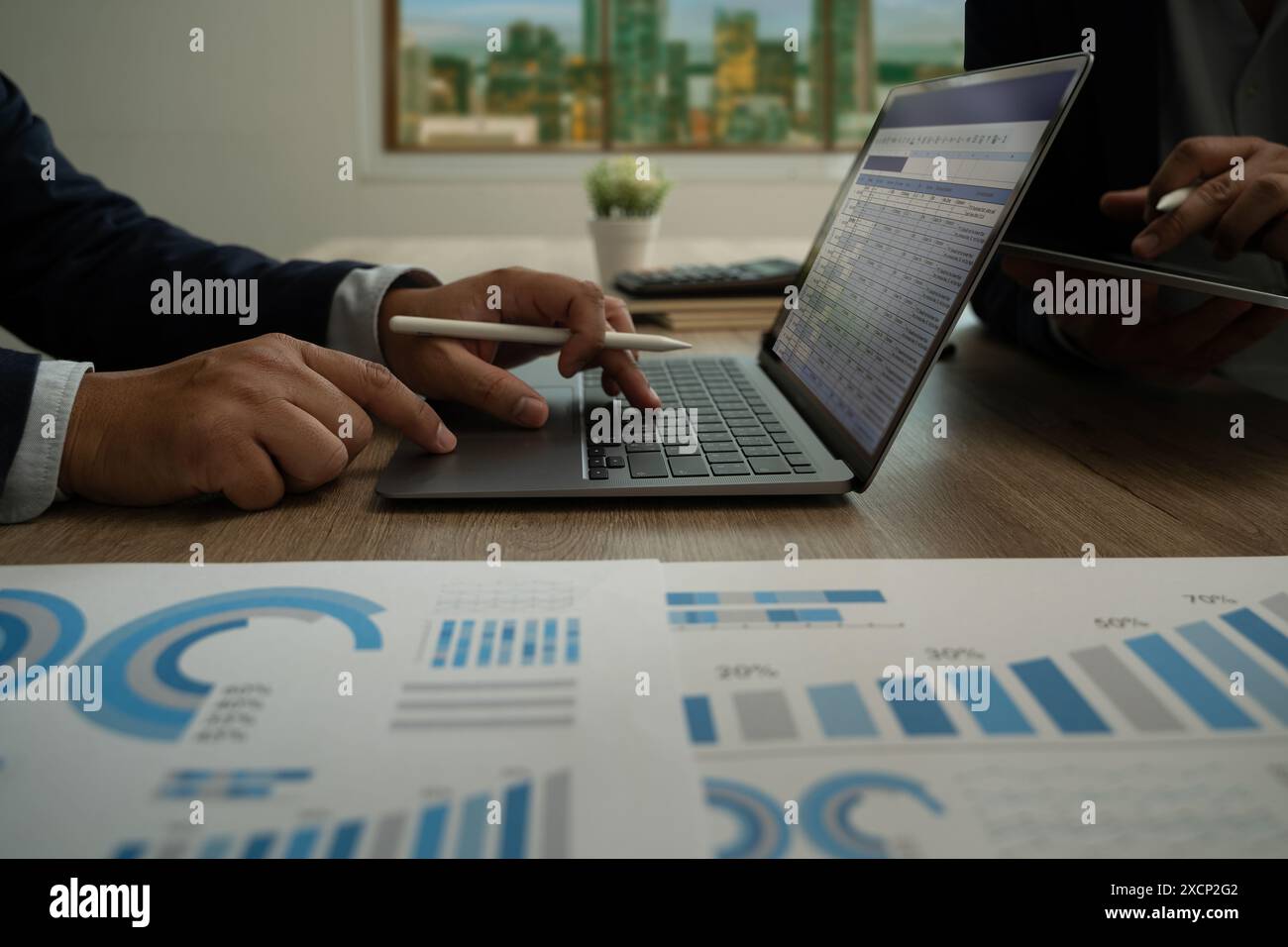 Business man trader investor planning analyst financial chart data analysis dashboard on paper Stock Photo