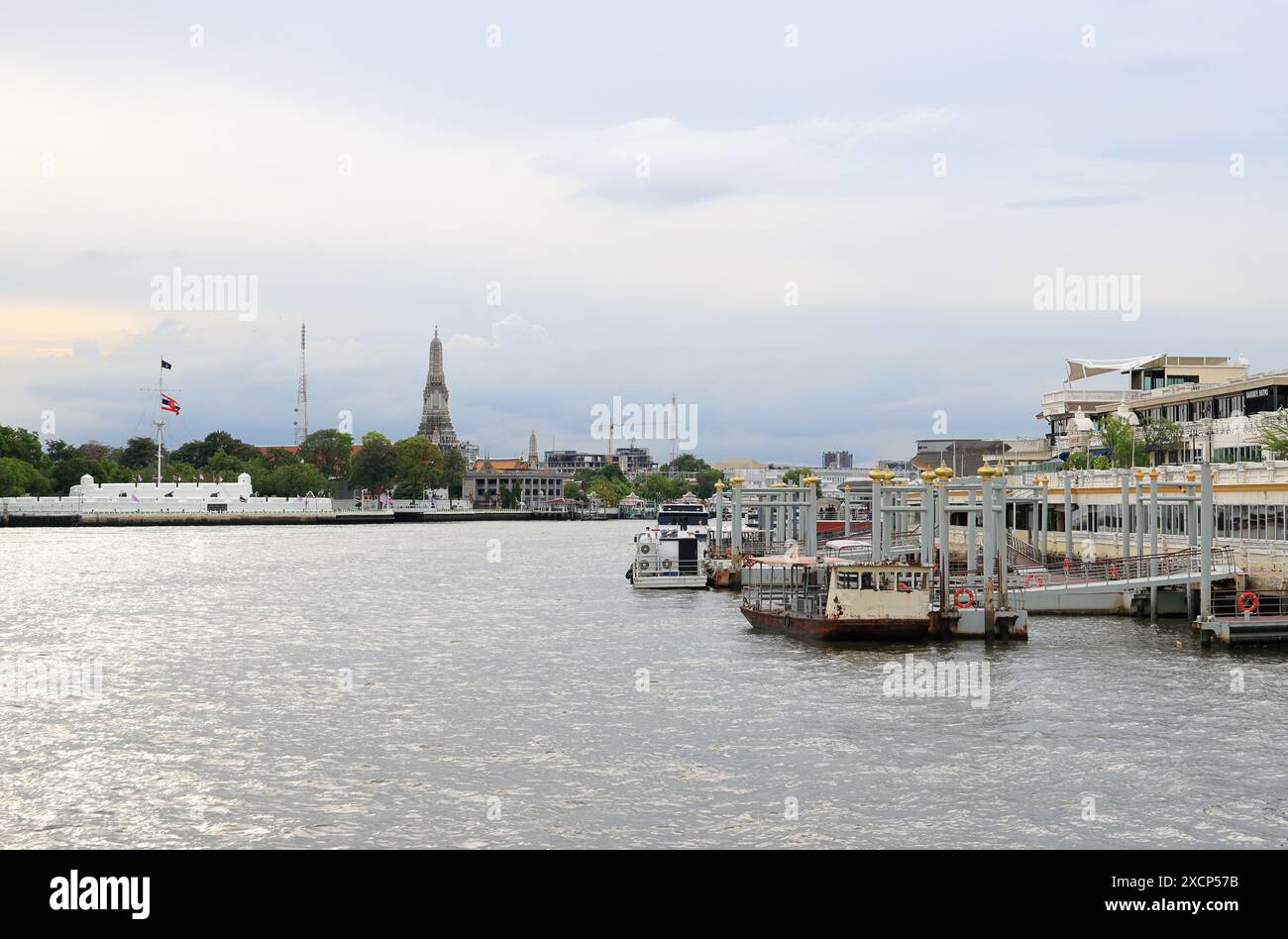 pier on the bank of Chao Phraya River. Waiting For Service Boat Travel and transport Along Chao Phraya River. Stock Photo